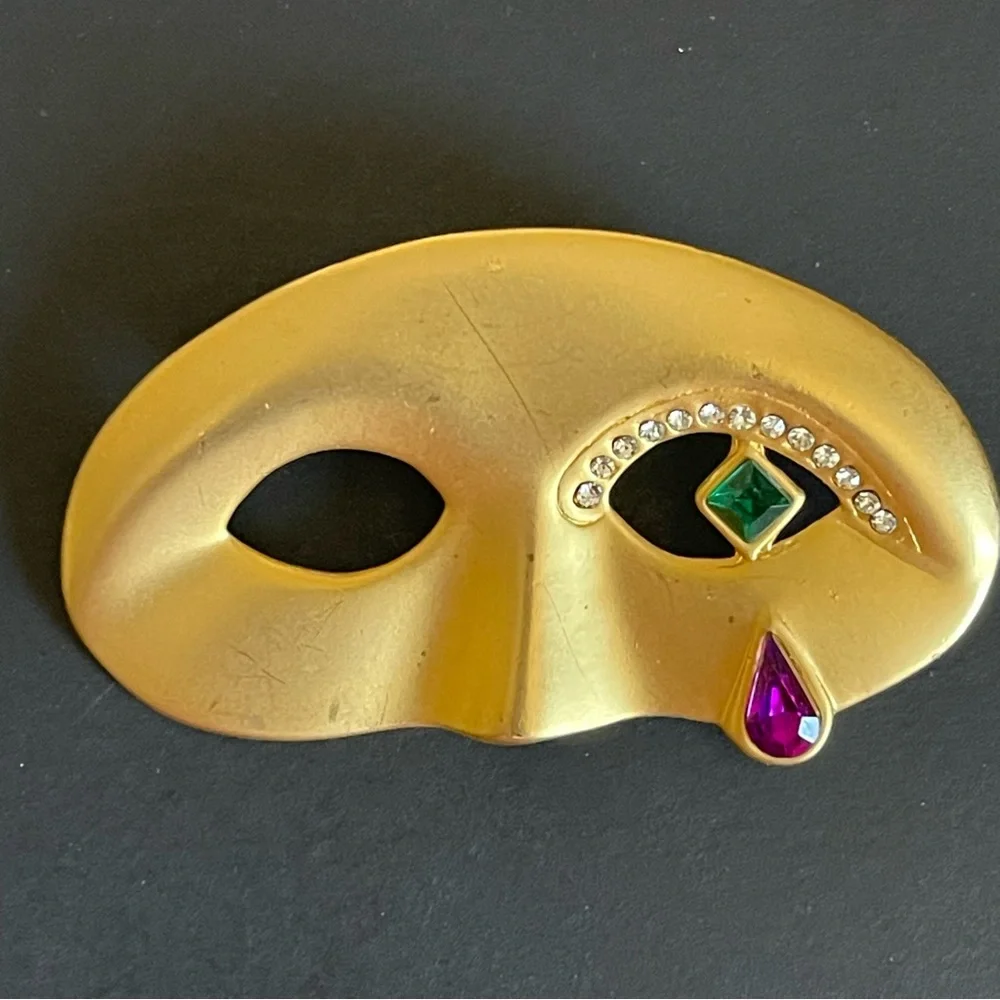Vintage gold tone rhinestone Tear drop Mask Brooch.